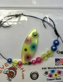Quality fishing lure with colorful design and durable wire harness for freshwater fishing.