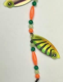 Colorful fishing lure with beads for enhanced bait presentation and fishing success.