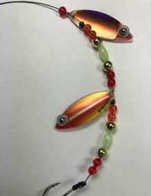 Bright fishing lure with beads and hooks for premium fishing tackle.