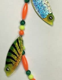 Beaded fishing lure with colorful fish design and shiny blade for freshwater or saltwater fishing.