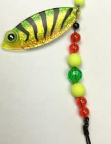 Colorful fishing lure with beads and hook for freshwater fishing.