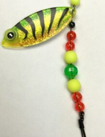 Colorful fishing lure with beads and hook for freshwater fishing.