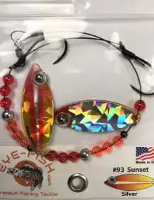 Sunset Silver fishing lure with colorful holographic finish, beads, and sharp hooks for premium fish.