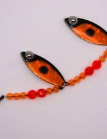 Premium fishing lure with orange and black design for freshwater fishing.
