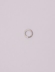 Small metal fishing hook accessory for fishing tackle and gear.