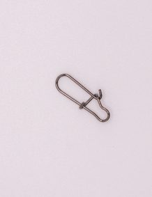 Metal fishing snap hook for secure attachment of lures and tackle.