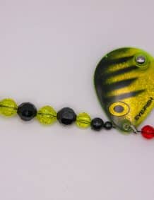 Quality fishing lure with beads and spinner for freshwater fishing.