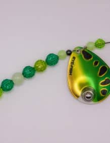Fishing lure with beads for freshwater fishing, green and yellow color.