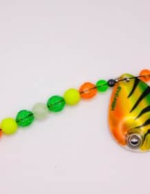 Fishing lure with colorful beads and spinner for freshwater and saltwater fishing.