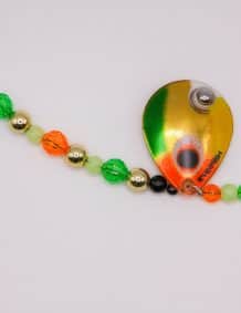 Bright fishing lure with beads and hook, ideal for freshwater and bass fishing enthusiasts.