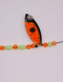 Premium fishing lure with beads and hook for freshwater fishing.