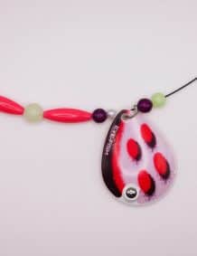 Fishing lure necklace with colorful beads and ladybug design.